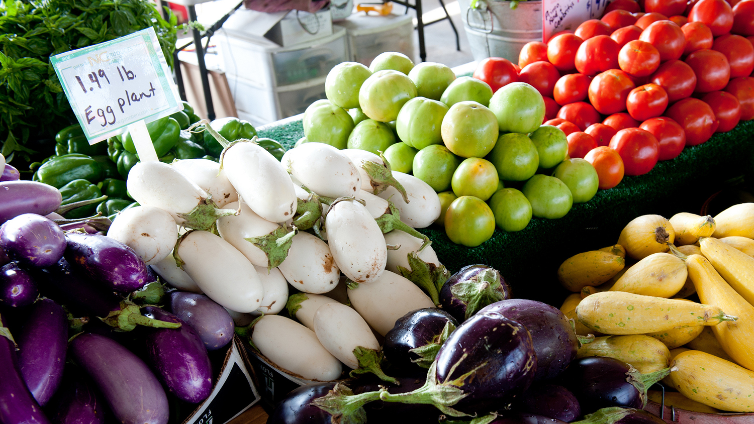 Colorful produce lines the booths at the NC State Farmers' Market.