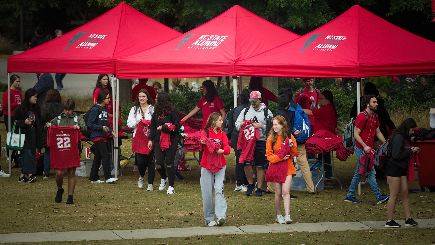 Stduents enjoy Red and White Week Kickoff at Stafford Commons. The event was highlighted by 360-degree photo booths, bubble soccer inflatables and more. Photo by Marc Hall