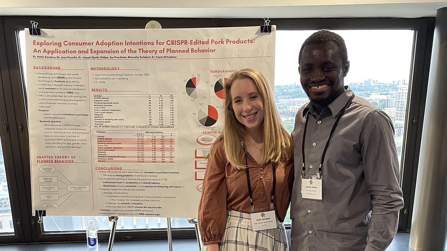 Katie Sanders and Joseph Opoku Gakpo with a poster